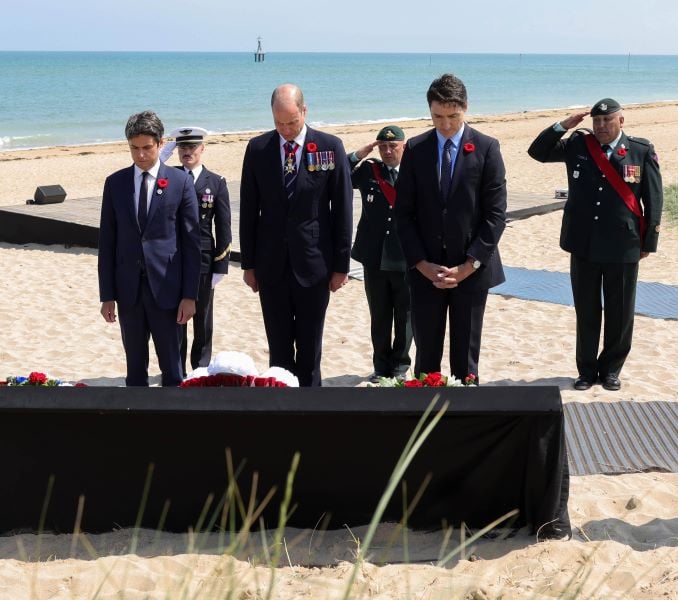 A photo of Trudeau along with the Prince of Wales taken while he was at Juno Beach in France paying his respects to the fallen Allied troops