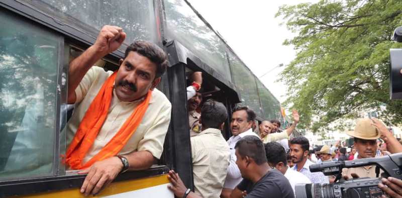 A photograph of B. Y. Vijayendra during a Bharatiya Janata Yuva Morcha (BJYM) protest