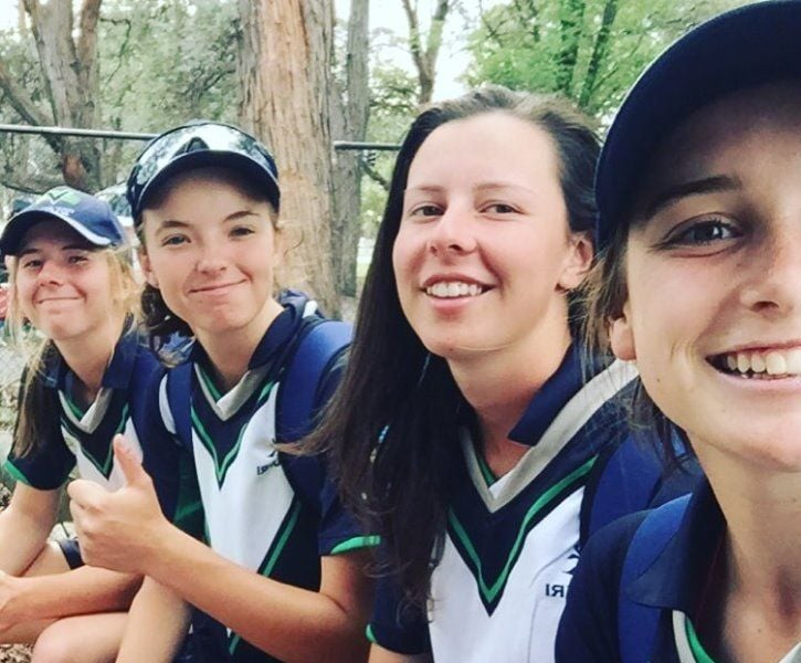 A photograph of Georgia Wareham (last) with her Victoria Women