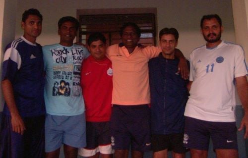 A photograph of Jo Paul Ancheri with the Indian national football teammates