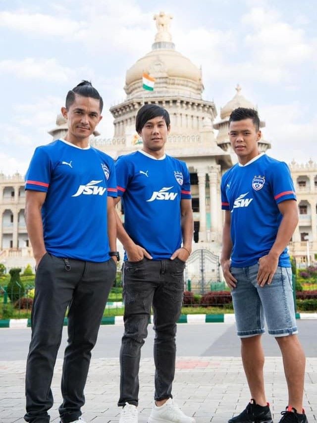 A photograph of Udanta Singh (middle) with Sunil Chhetri and his teammate