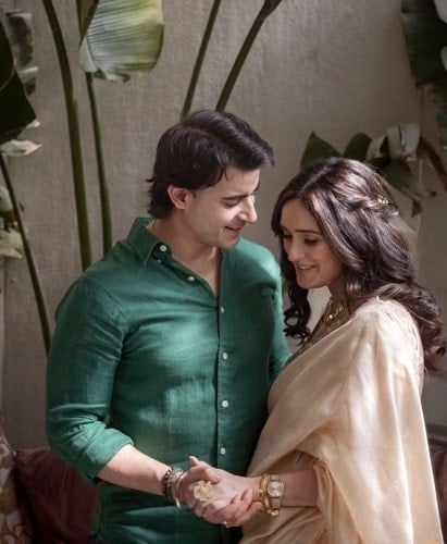 A picture of Gautam Rode with his wife at her baby shower