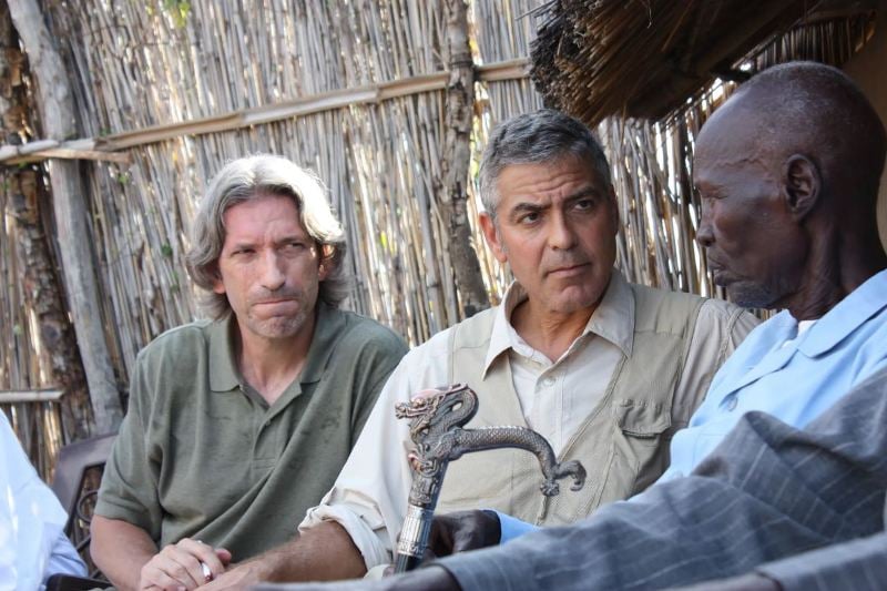 A picture of George Clooney (centre) and John Prendergast (left) from his visit to Sudan