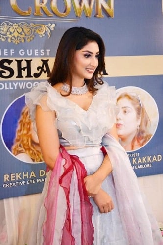 A picture of Isha Sharma as a chief guest at an event