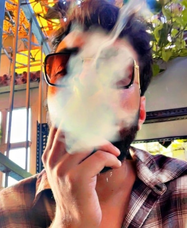 A picture of Nalin smoking