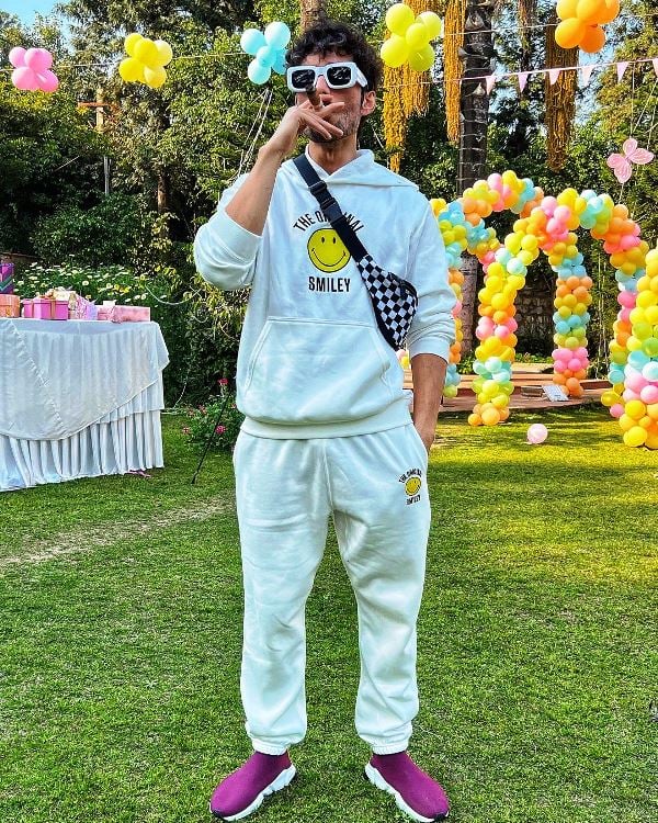 Rishabh Sawhney smoking a cigar