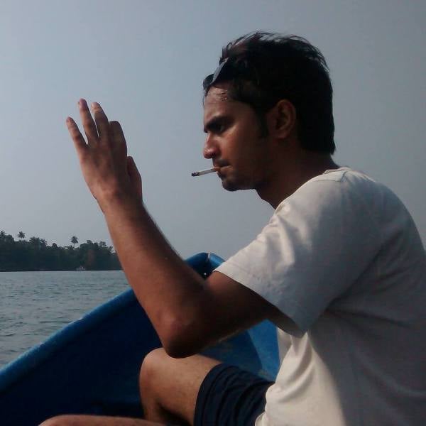 A picture of Shardul Bhardwaj while smoking a cigarette