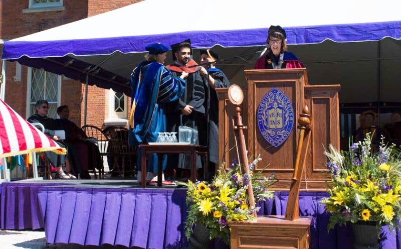 A picture of Vir das being awarded the Honorary Degree of Doctor of Fine Arts