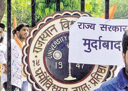 A poster condemning the government over the use of force on agitating students at Rajasthan University in 2015