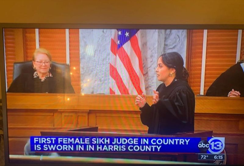 A screenshot of Manpreet giving a speech after taking oath as a Judge