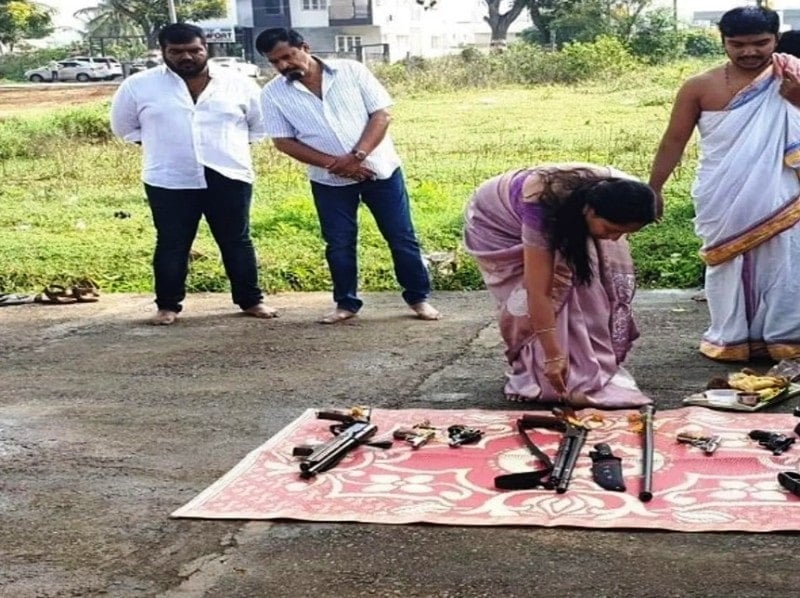 A still from the viral video in which Muthappa Rai is standing behind his wife Anuradha during the Shastra Pooja