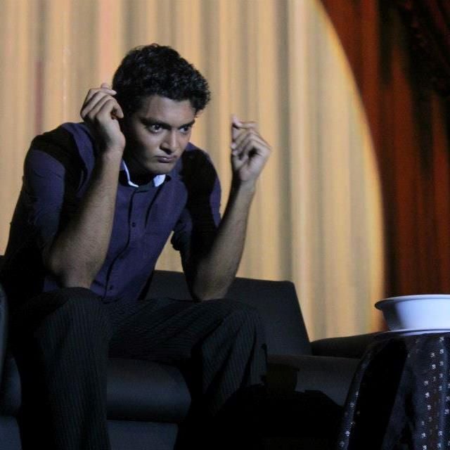 A still of Akbar Chaudry while performing on stage in Pakistan