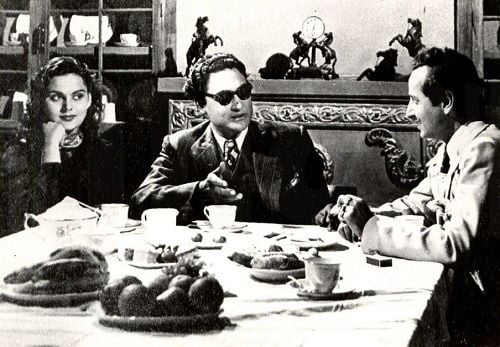 A still of Pran and Ashok Kumar from the film Afsana