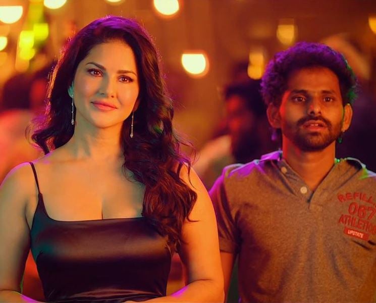 A still of Sadda M Hussain with Sunny Leone from the Telugu film Ginna