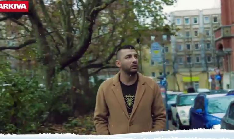 A still of Florian Carkanji from the Albanian music video Melody (2017)