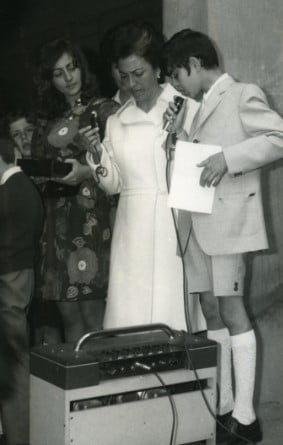 A teenage Andrea Bocelli preparing for a music concert with his mother