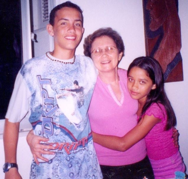 A teenage photo of Eva Pacheco with her maternal grandmother and elder brother