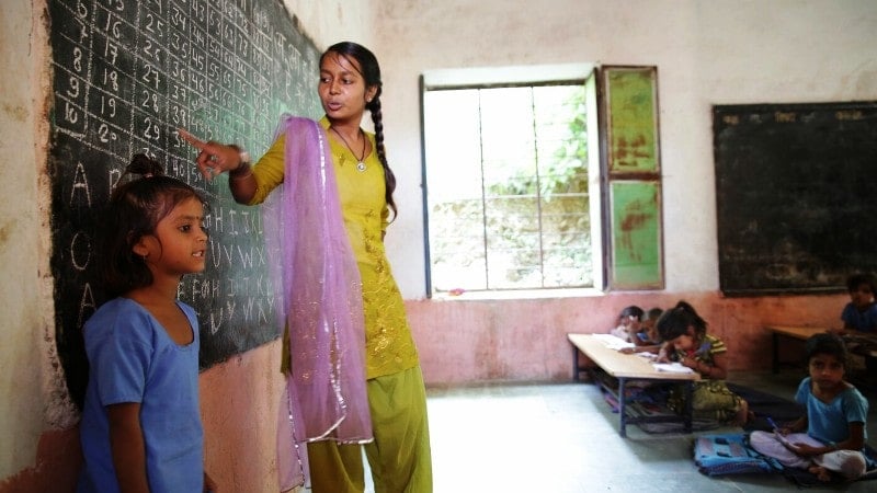 A volunteer from Educate Girls teaching at a rural village