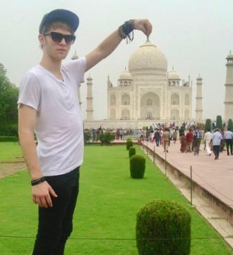 A young Drew Hicks posing with Taj Mahal
