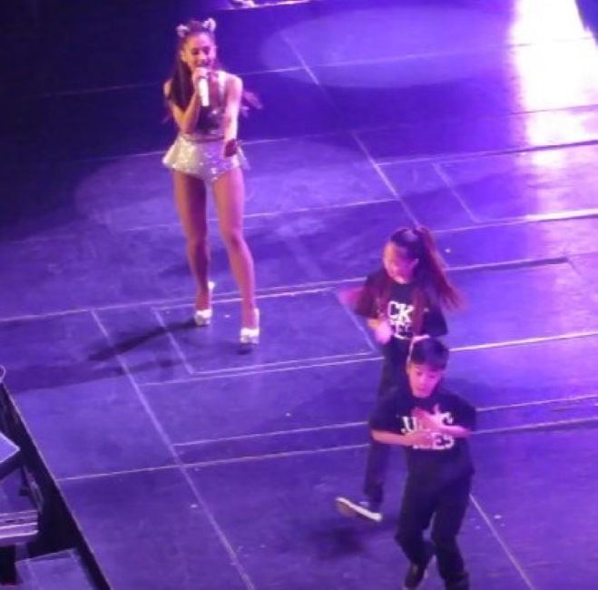 AC Bonifacio performing with Ariana Grande and her dance partner Lucky Ancheta