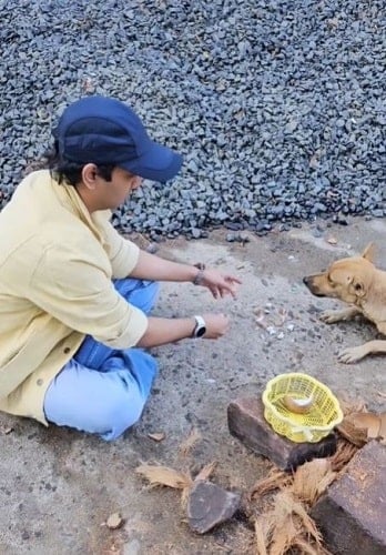 Aakash Dabhade with a dog