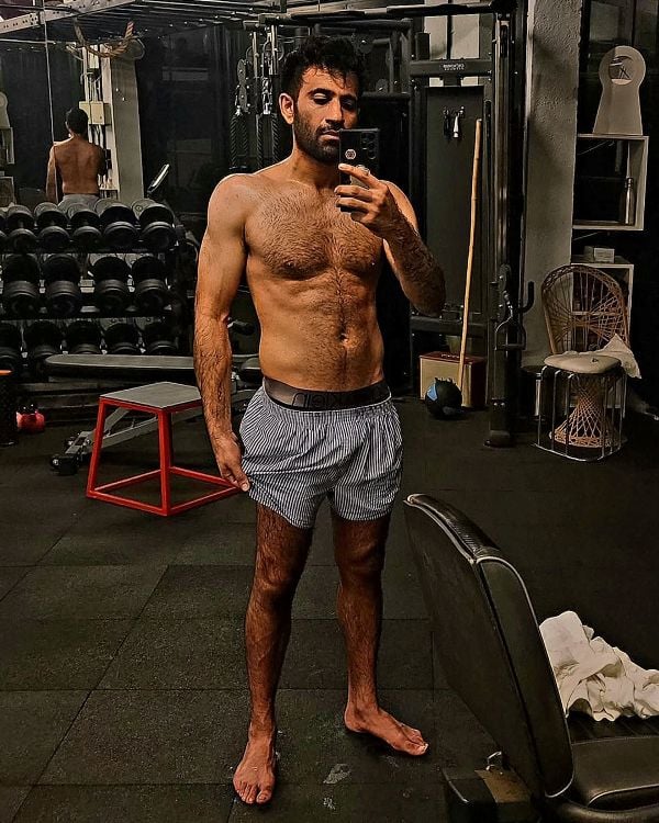 Aaryamann Sethi posing at a gym