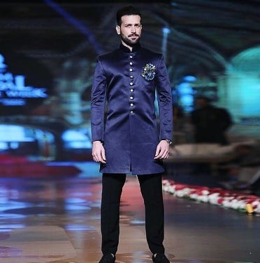 Abdullah Ejaz while walking the ramp at a fashion show