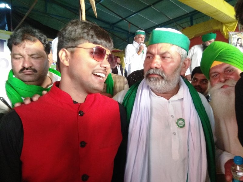 Abhay Sharma with the farmer