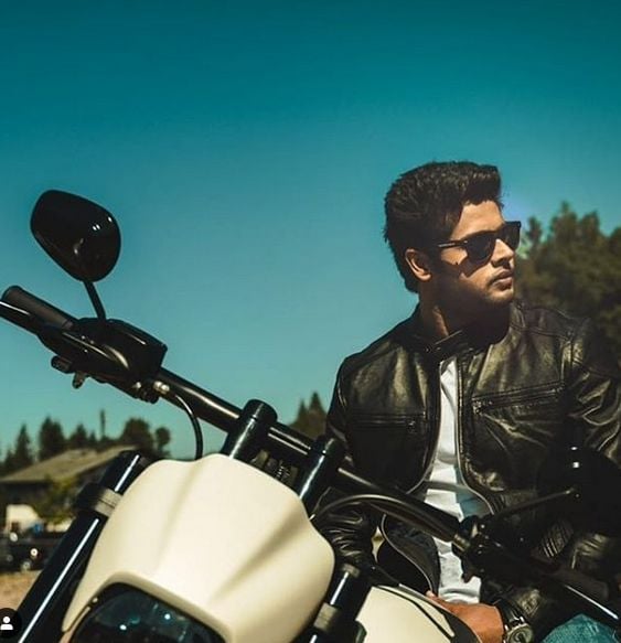 Abhimanyu Dassani riding a bike