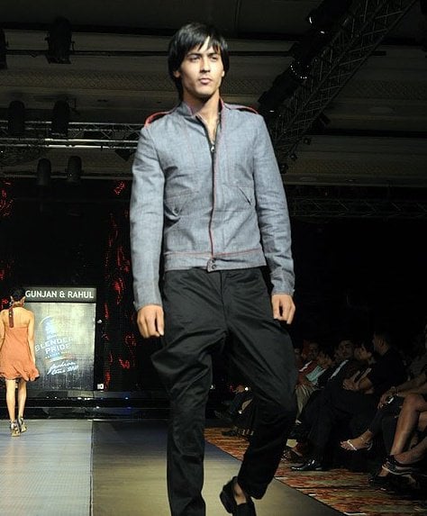 Abhimanyu Tomar walking the ramp for fashion designers Gunjan and Rahul