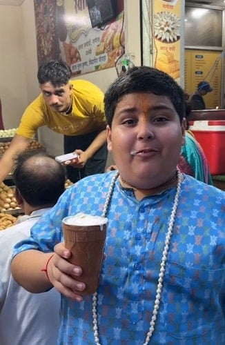 Abhinav Arora drinking lassi