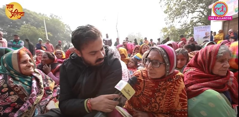 Abhinav Pandey interviewing a group of local women during the inauguration ceremony of the Ram Mandir