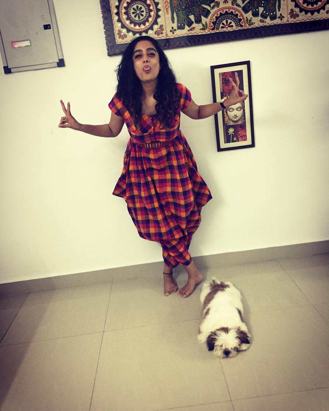 Abhirami Venkatachalam Posing With Her pet Dig