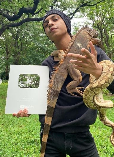 Abhirup Kadam posing with his Silver Youtube Button