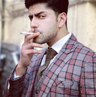 Abhishek Sharma while smoking a cigarette