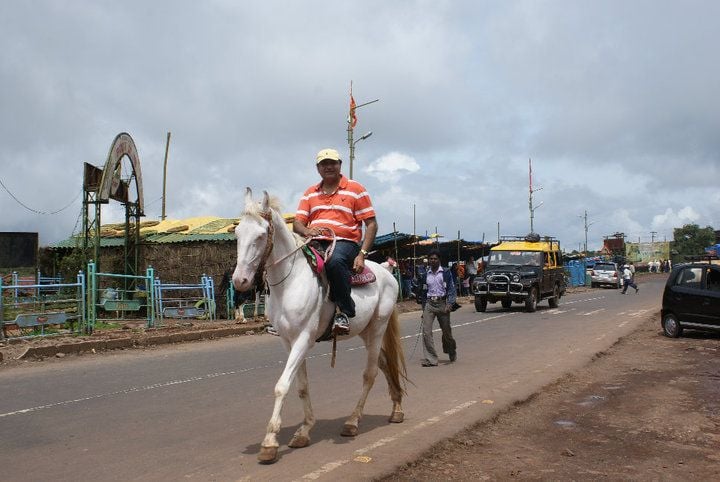 Abu Malik while riding a horse