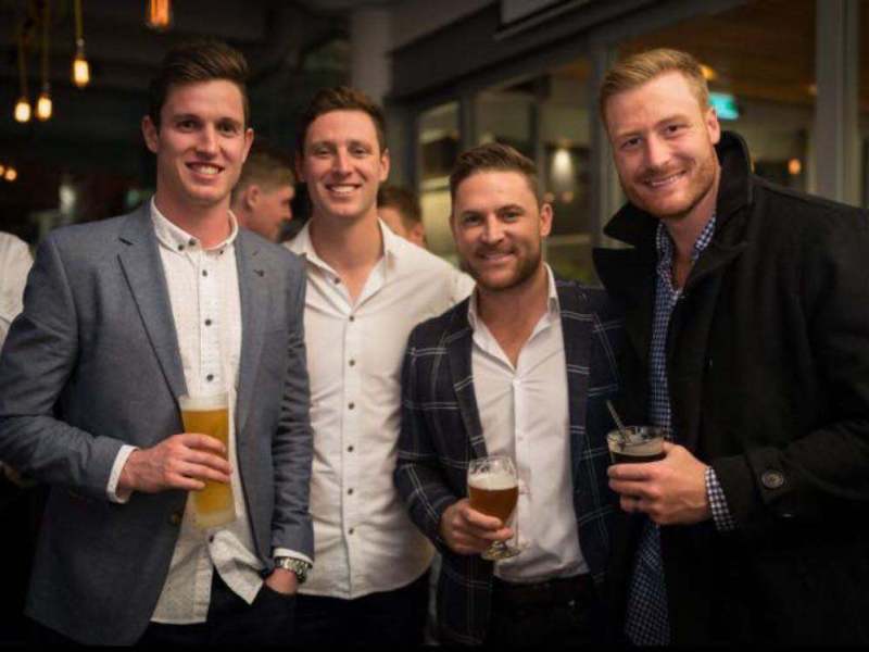 Adam Milne with Brendon McCullum and Martin Guptill
