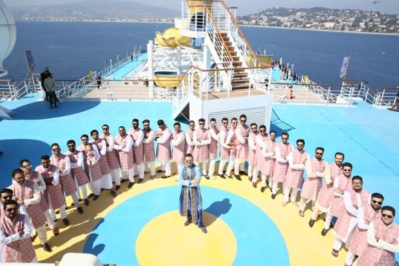 Adel Sajan (in blue) during a wedding function at the cruise