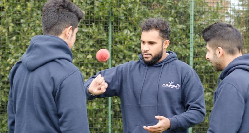 Adil Rashid giving coaching to young players at his academy