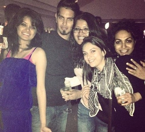 Aditi Rao Hydari holding a bottle of alcohol