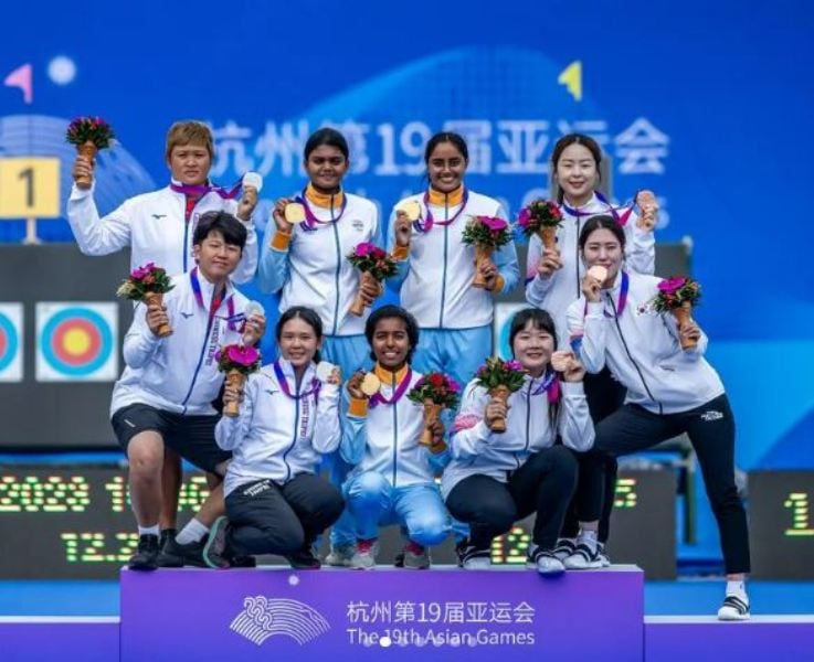 Aditi Swami (centre, sitting), along with others, at the 2023 Asian Games