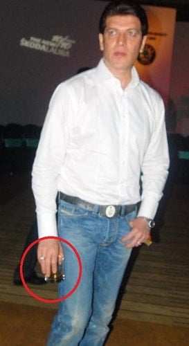 Aditya Pancholi holding a glass of alcohol