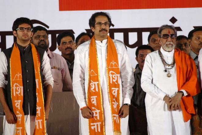 Aditya Thackeray (left) with his father Uddhav Thackeray (centre) and his grandfather Bal Thackeray (right)