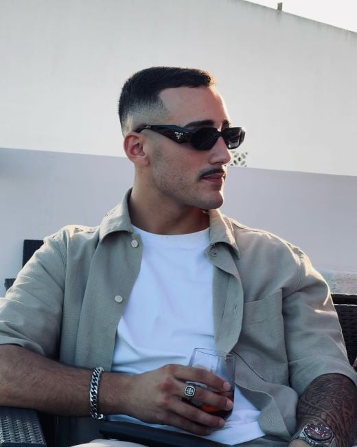 Afonso Leitão with an alcoholic drink