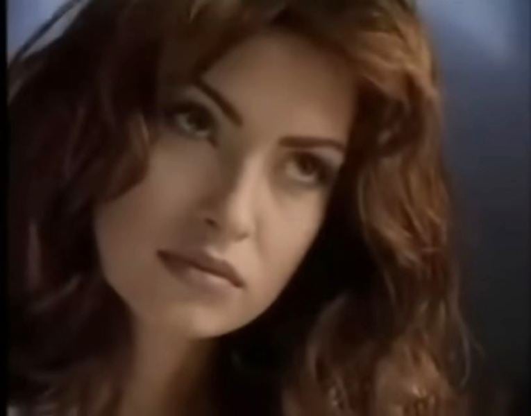 Agnieszka Maciąg in a still from the music video for the song 