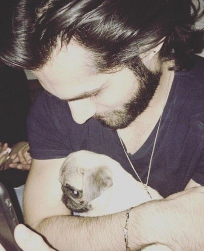 Ahmed Memon with a dog