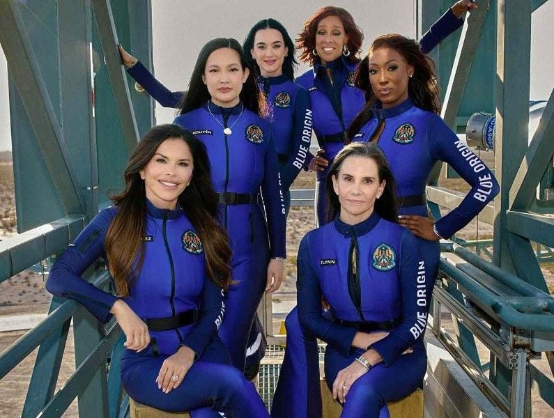 Kerianne Flynn (right, sitting) with the crew members of Blue Origin NS-31