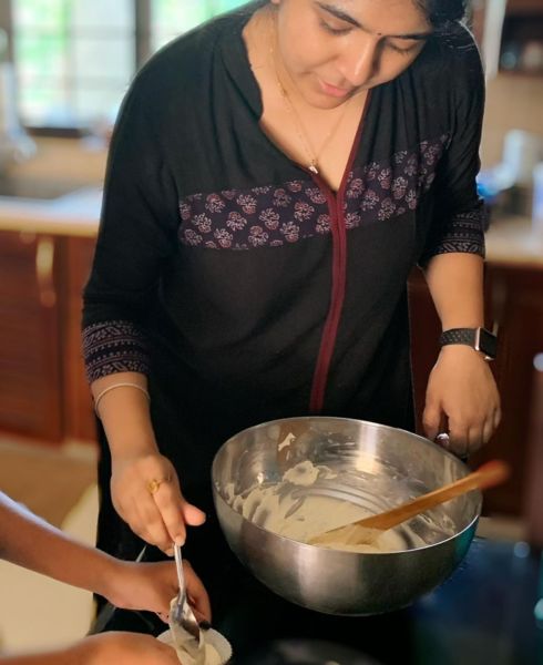 Aishwarya Prabhu baking a cake