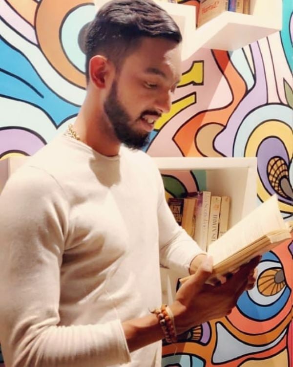 Ajay Mandal reading a book