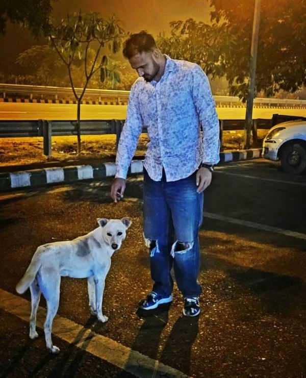 Ajeet Singh Yadav with a dog